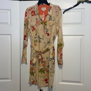 Beautiful dress with buttons half way down the dress